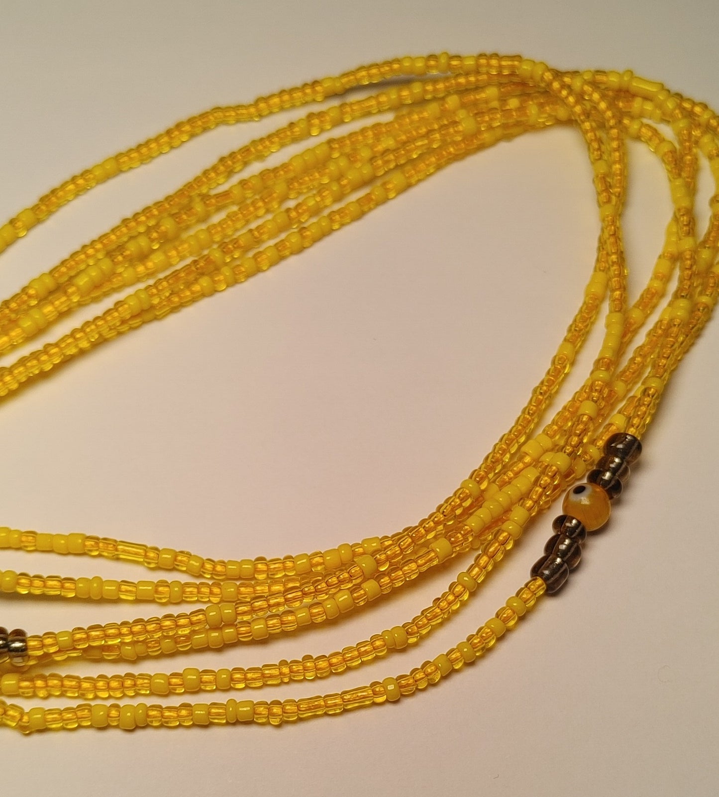 Yellow evil waistbeads