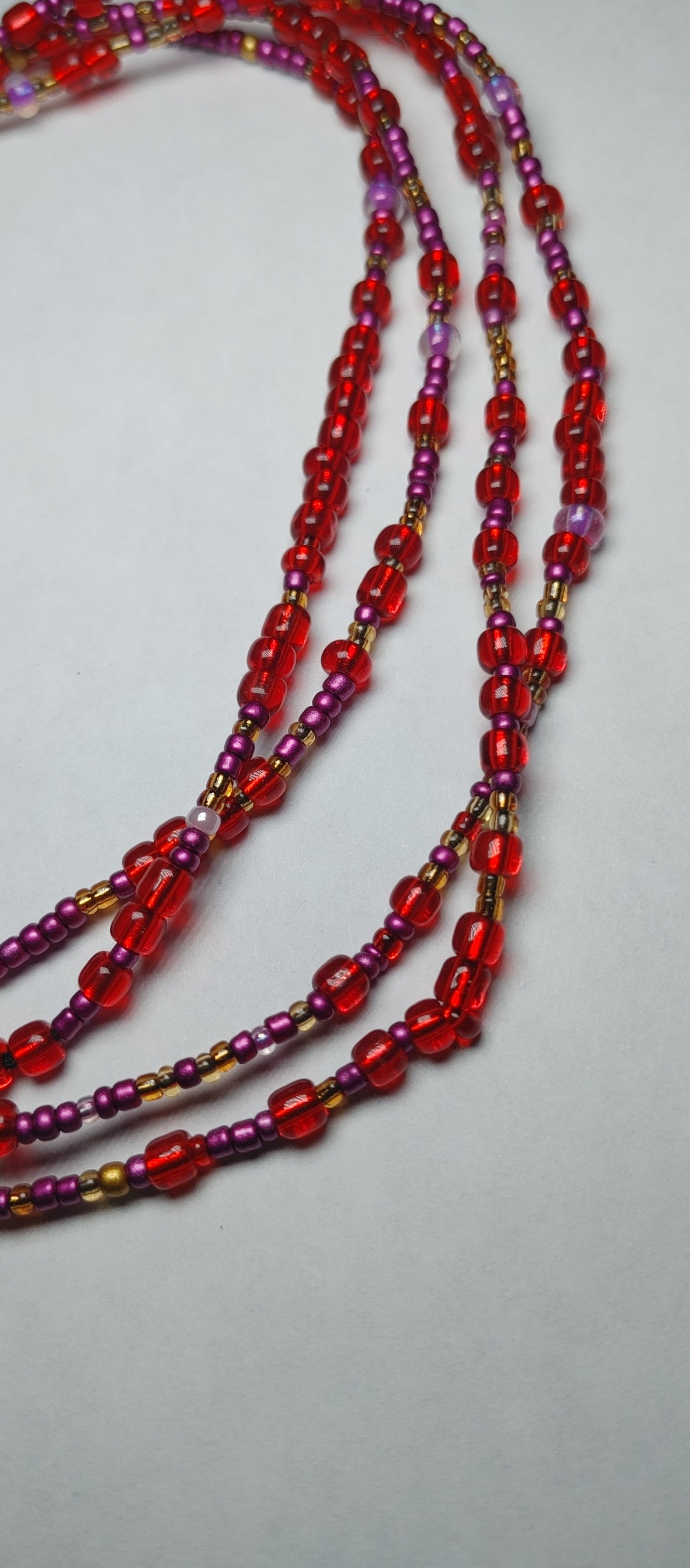 Red swrill waistbeads