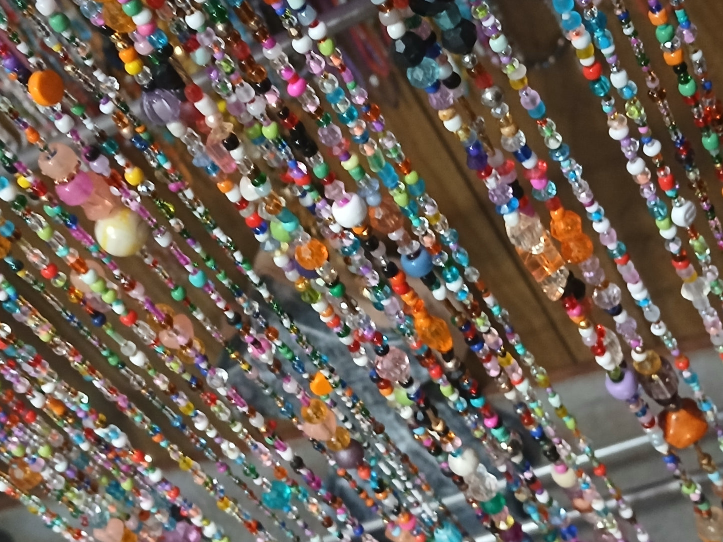Glow in the dark custom orange confetti bead curtains