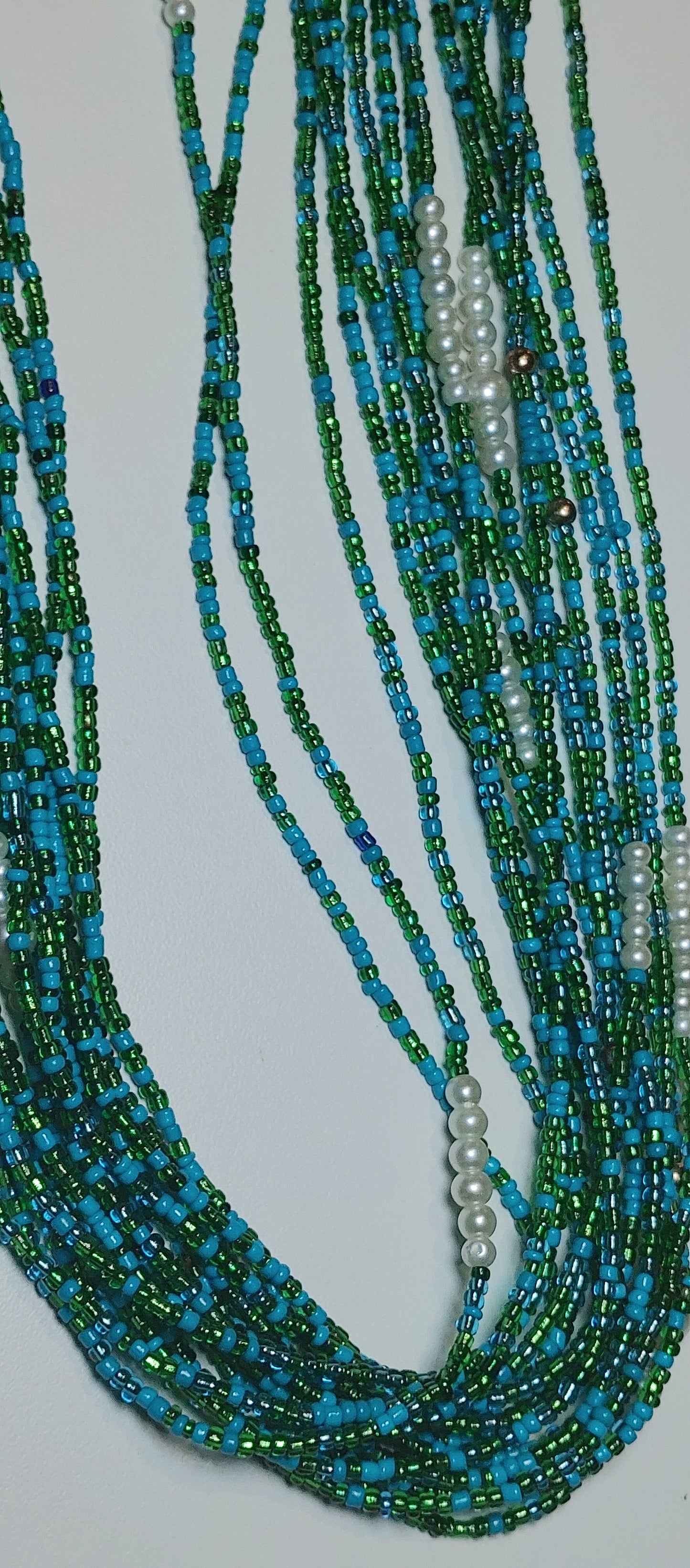 Blue green coral. Pearl waistbeads