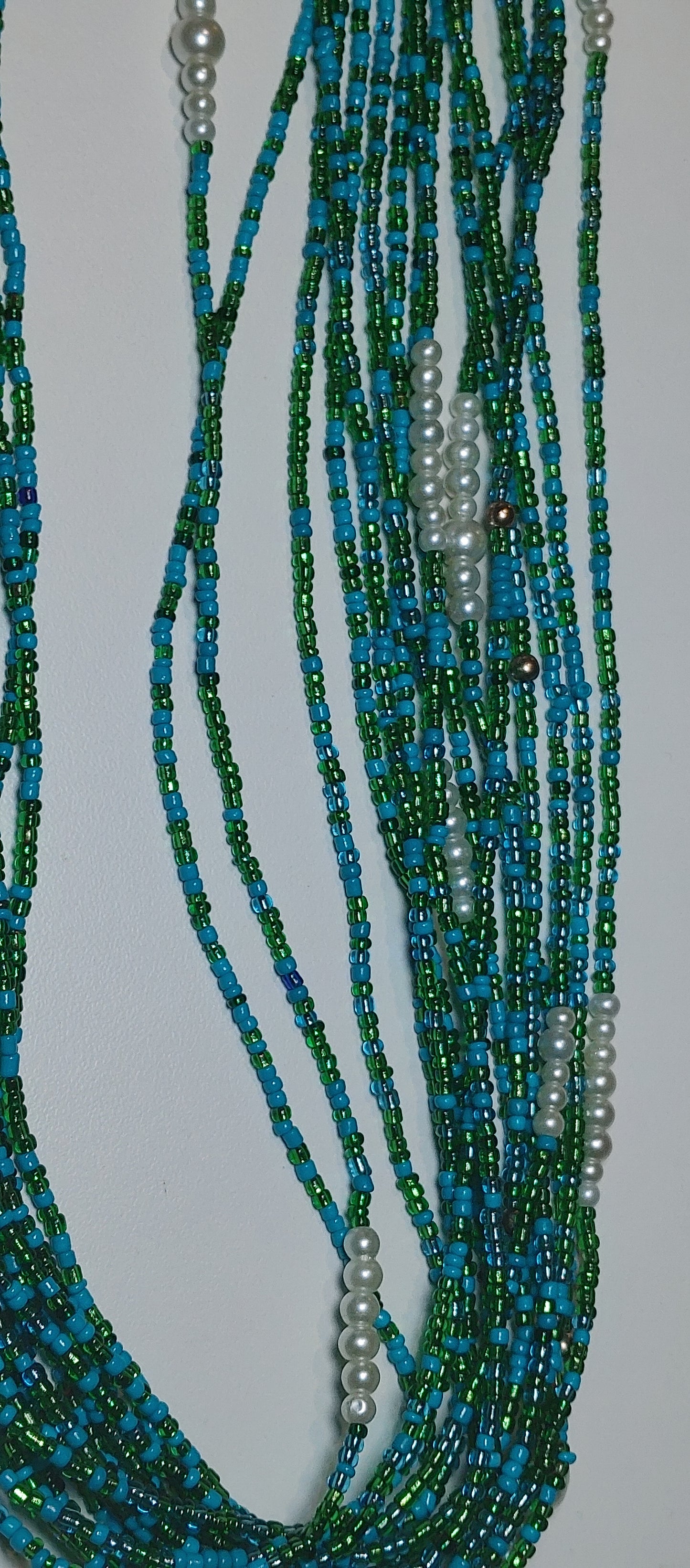 Blue green coral. Pearl waistbeads