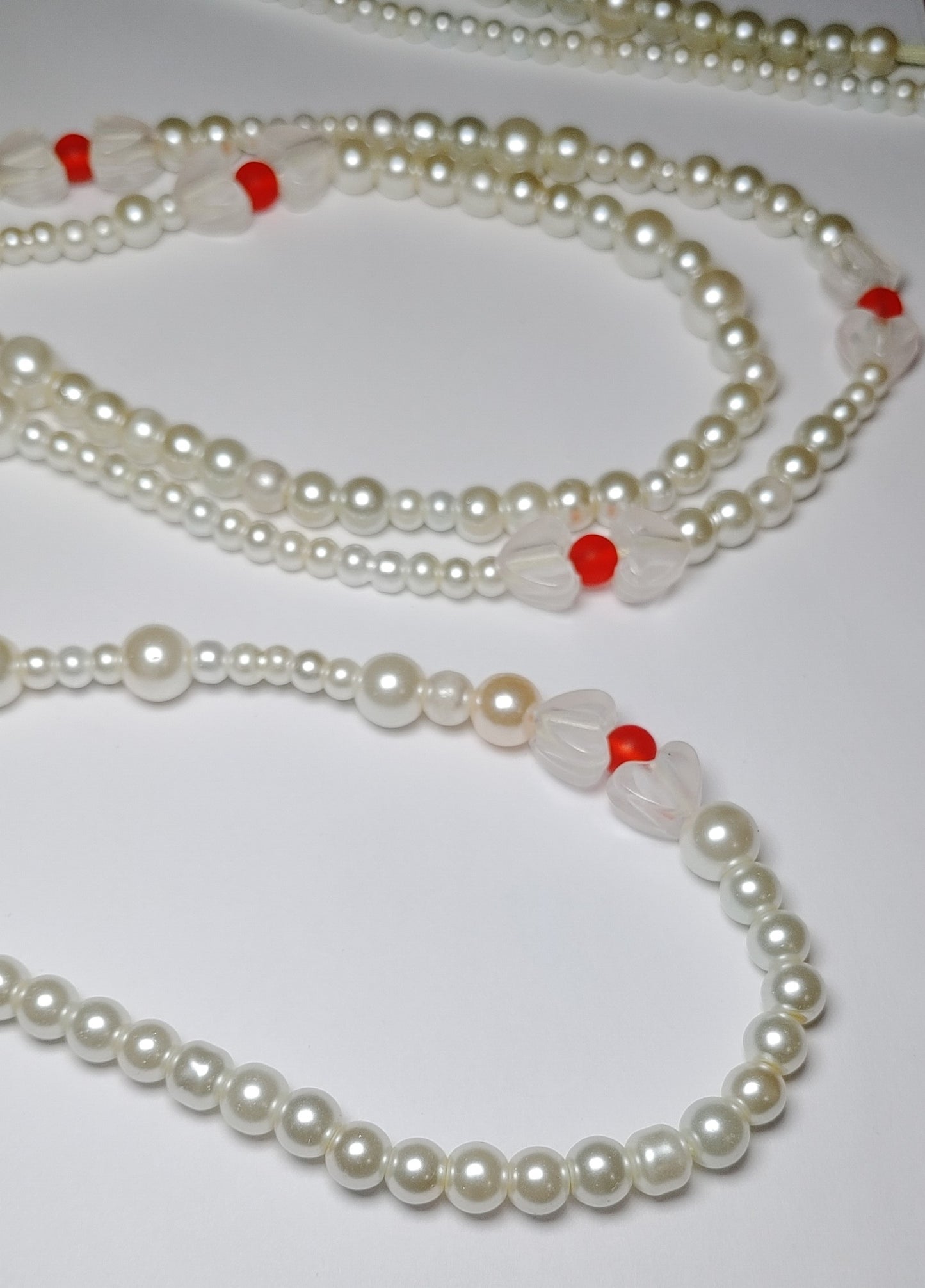 Pearl red glow in the dark waistbeads