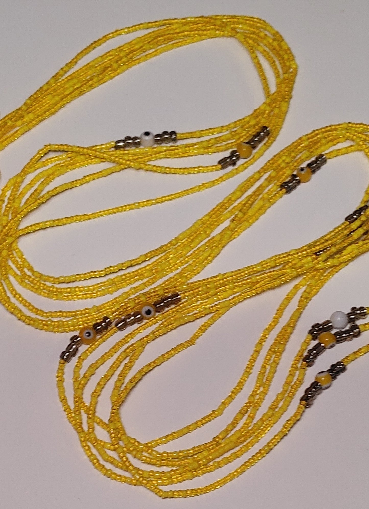 Yellow evil eye waistbeads