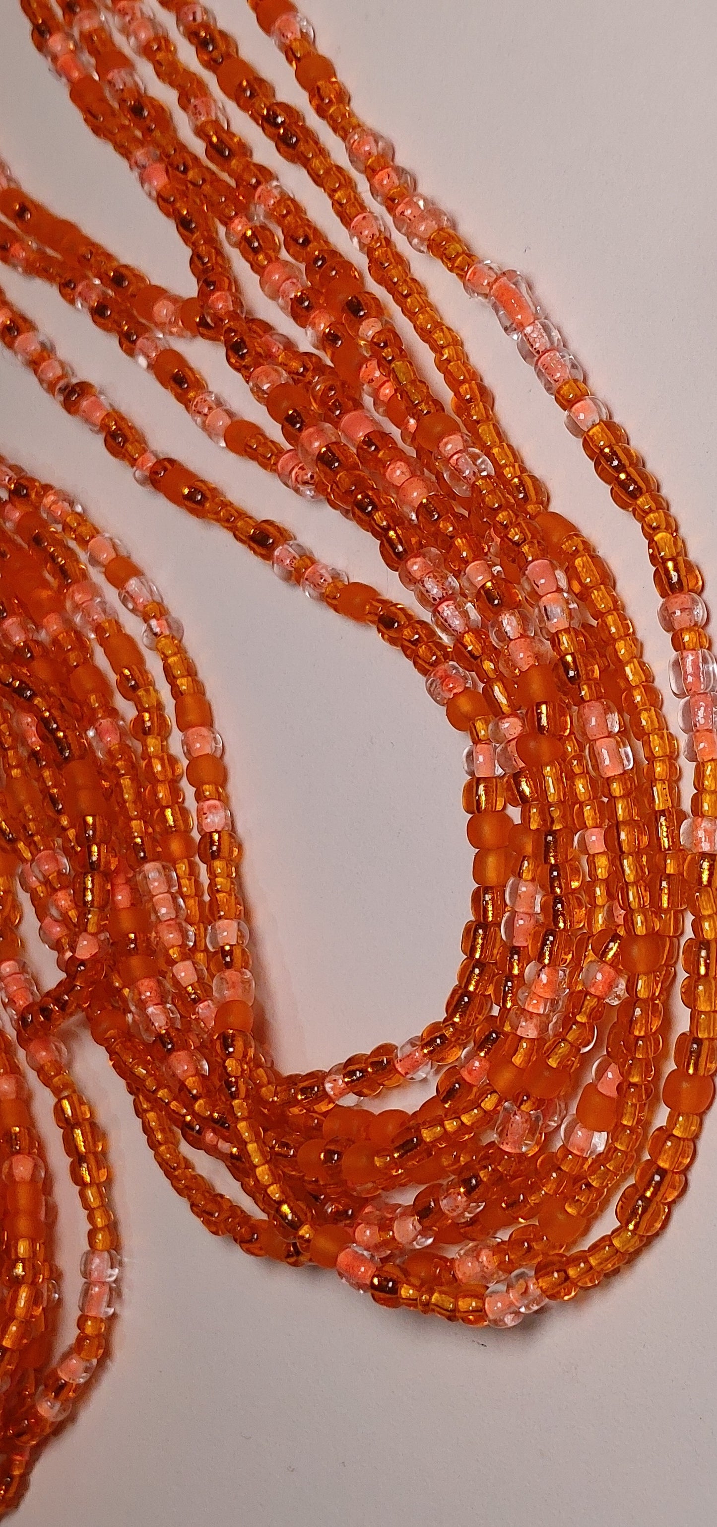 Orange "glow" waistbeads