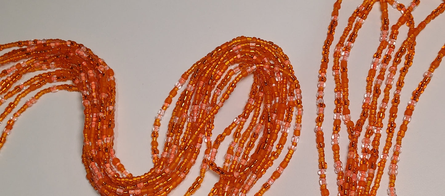 Orange "glow" waistbeads