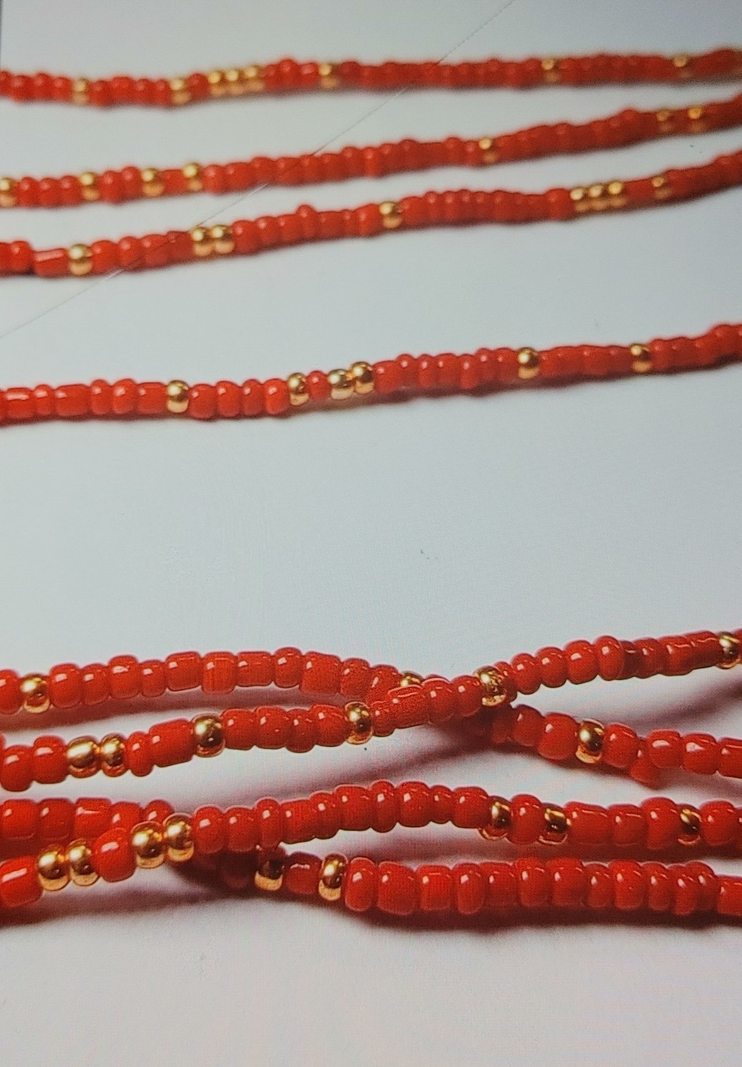 Red and gold waistbeads