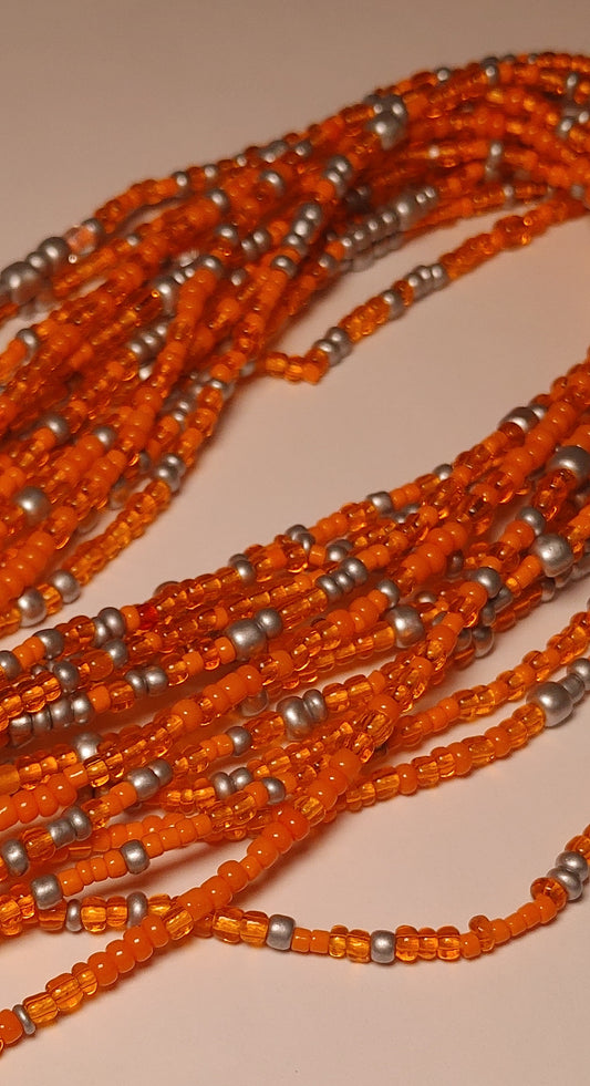 Orange orbit waistbeads