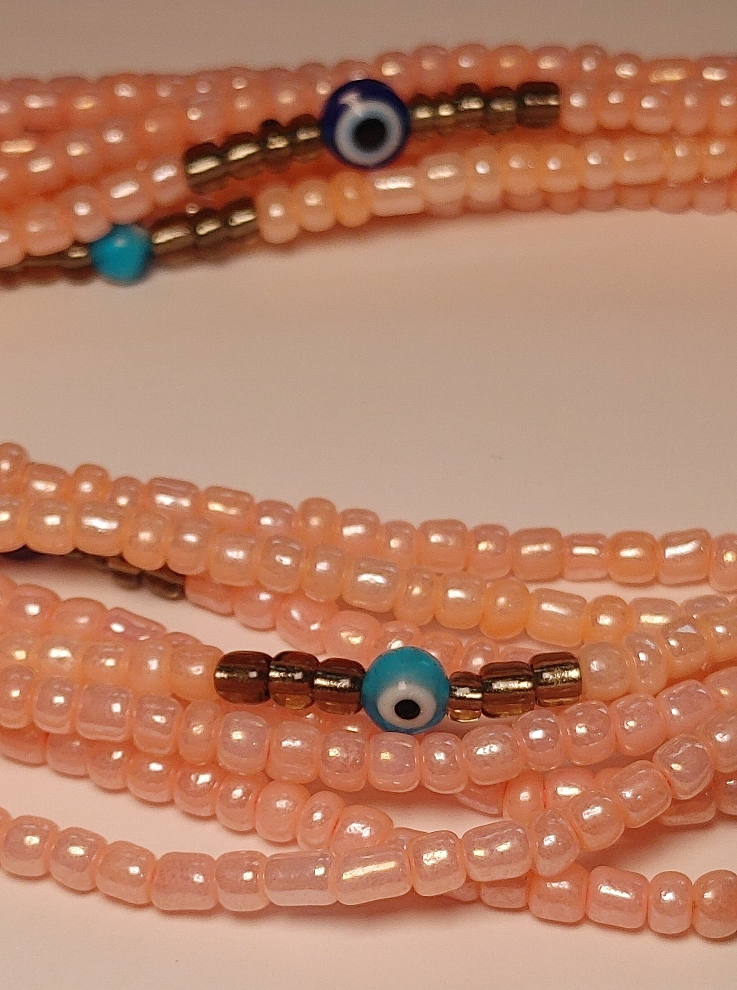 Pale pink evil eye waistbeads