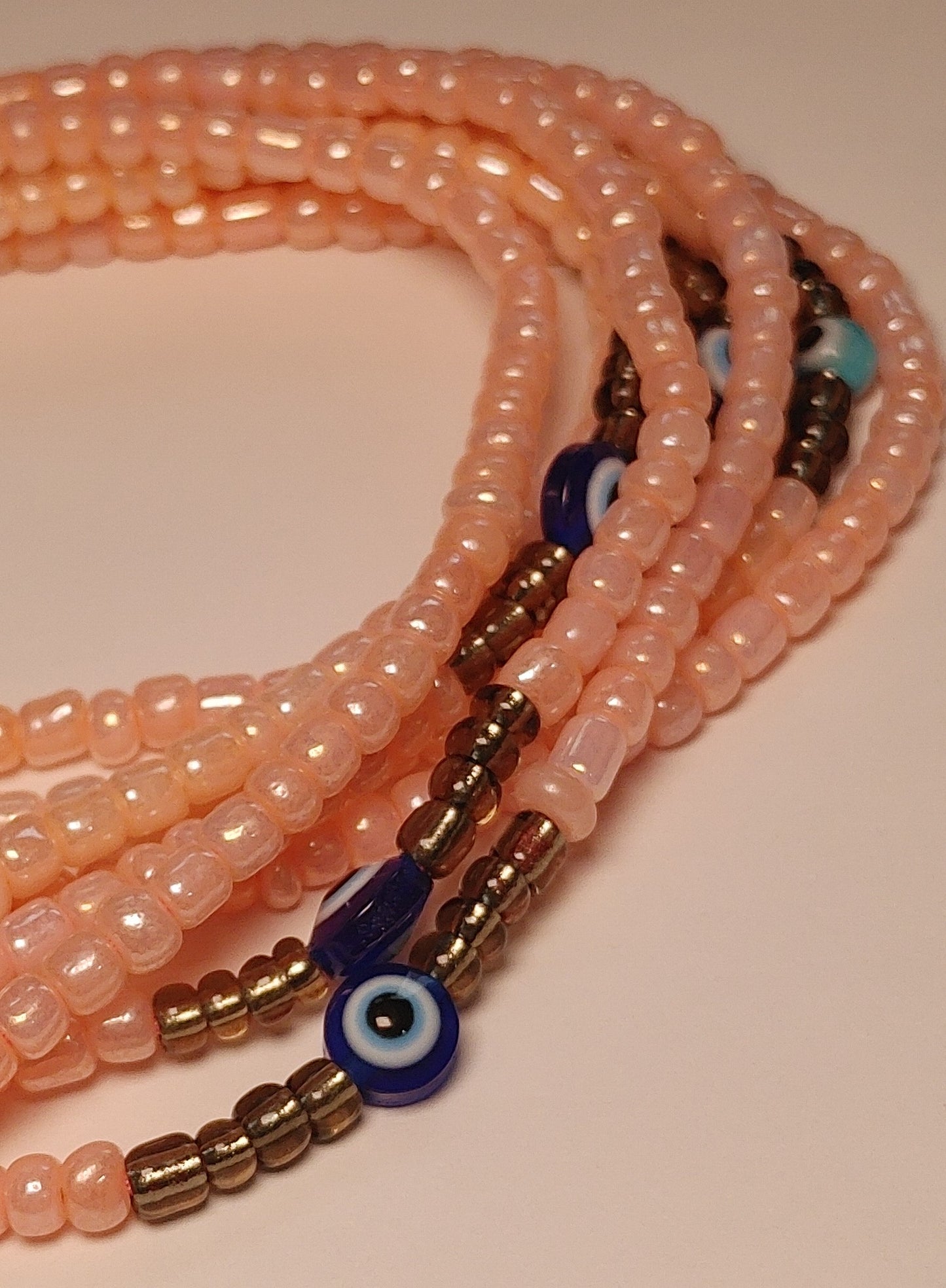 Pale pink evil eye waistbeads