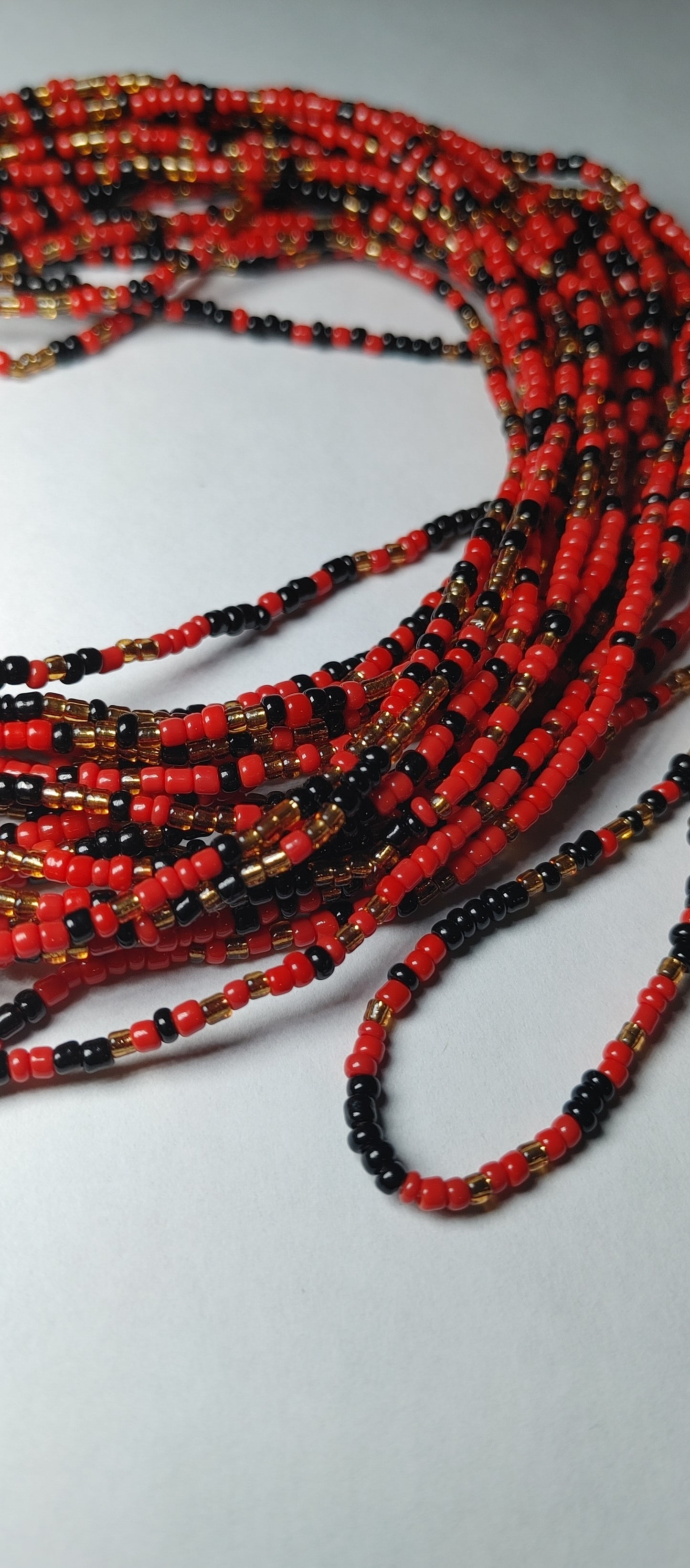 Red and black waistbeads