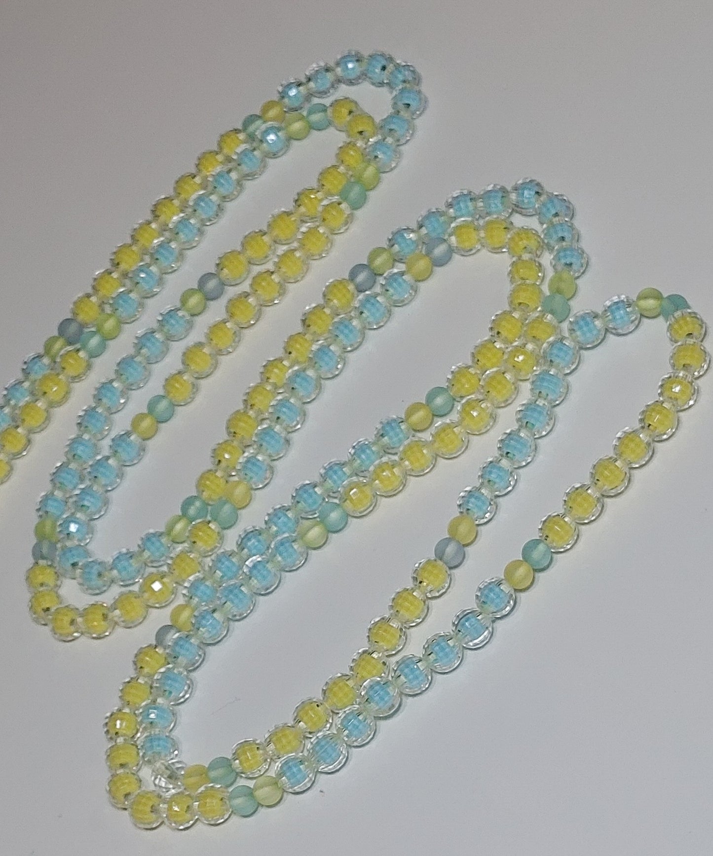 Blue yellow swirl waistbeads