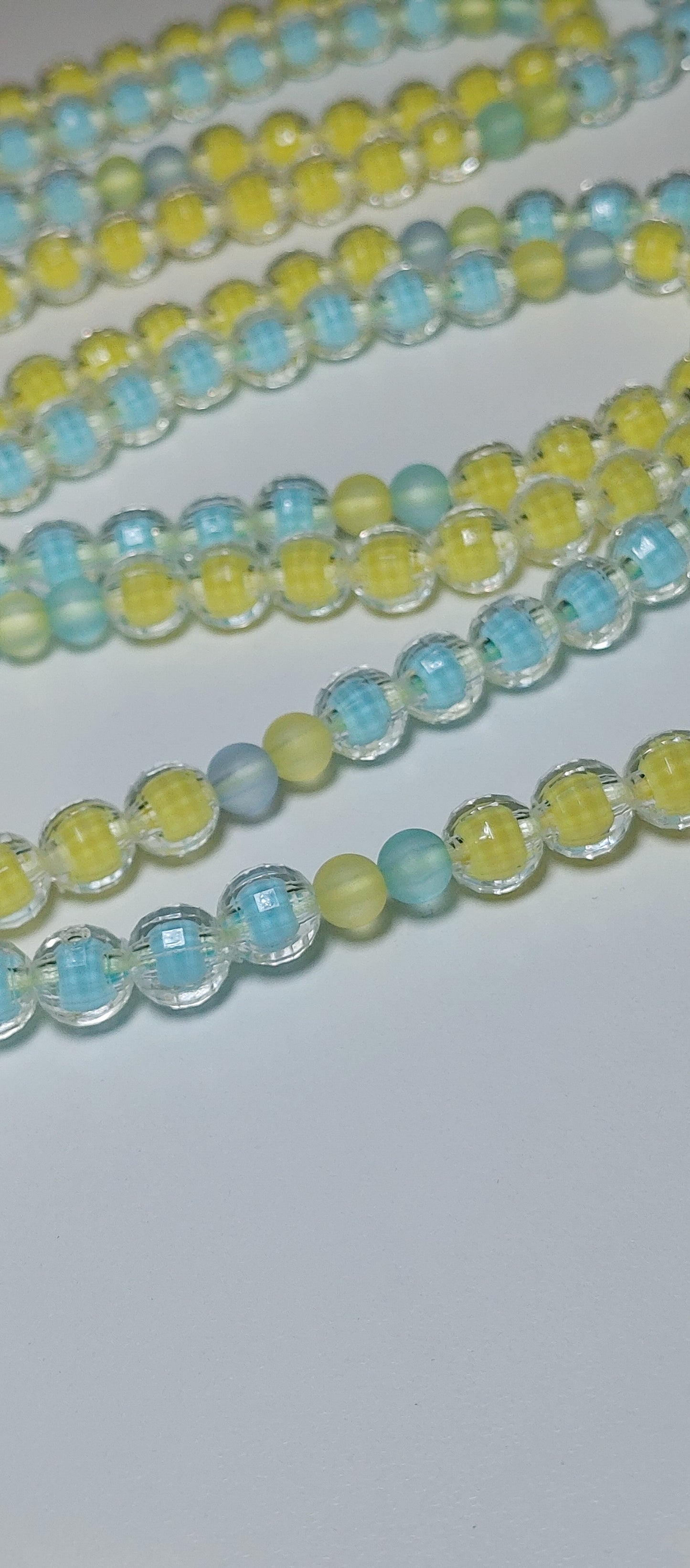 Blue yellow swirl waistbeads