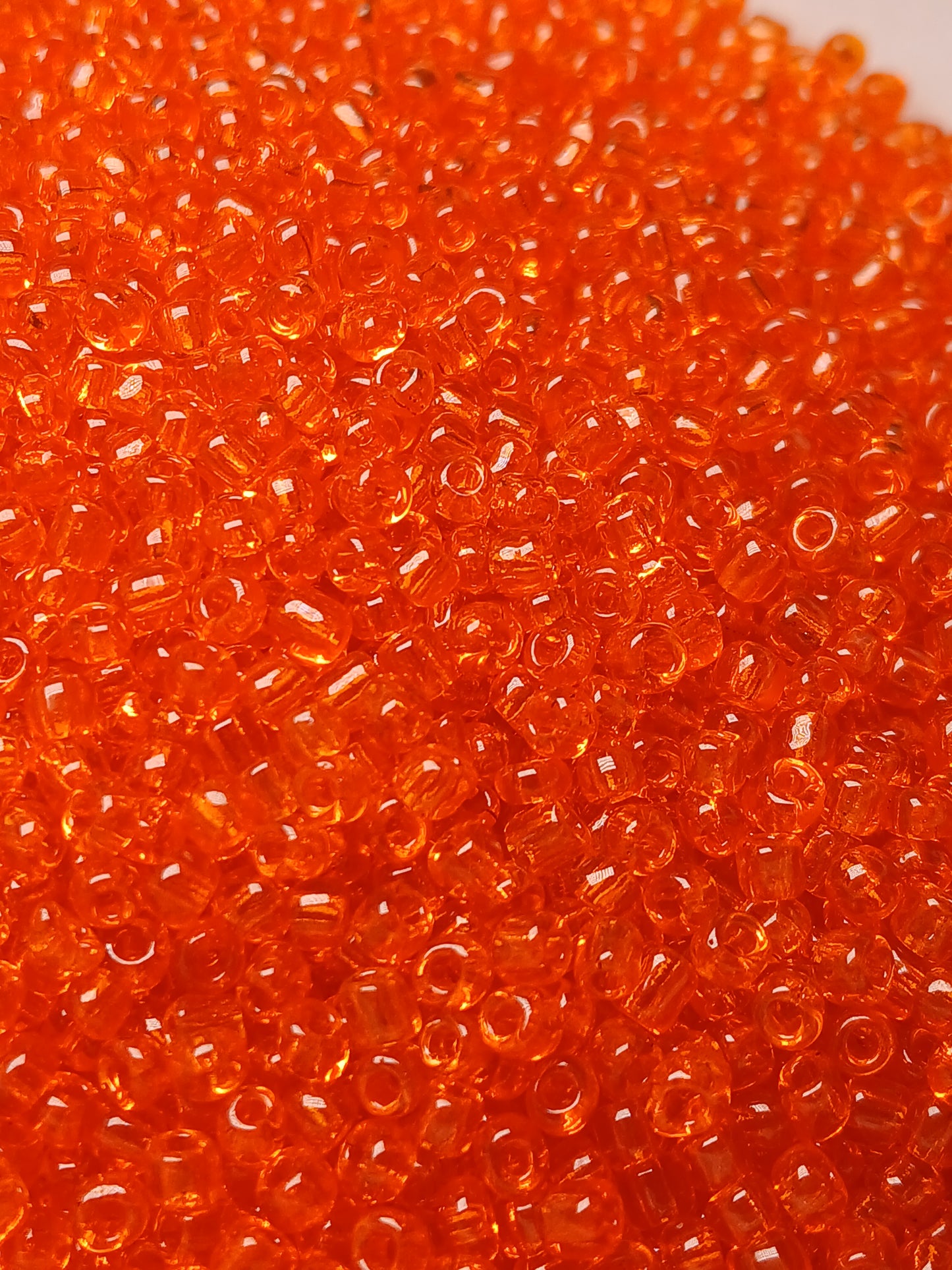 Transparent  orange seed beads