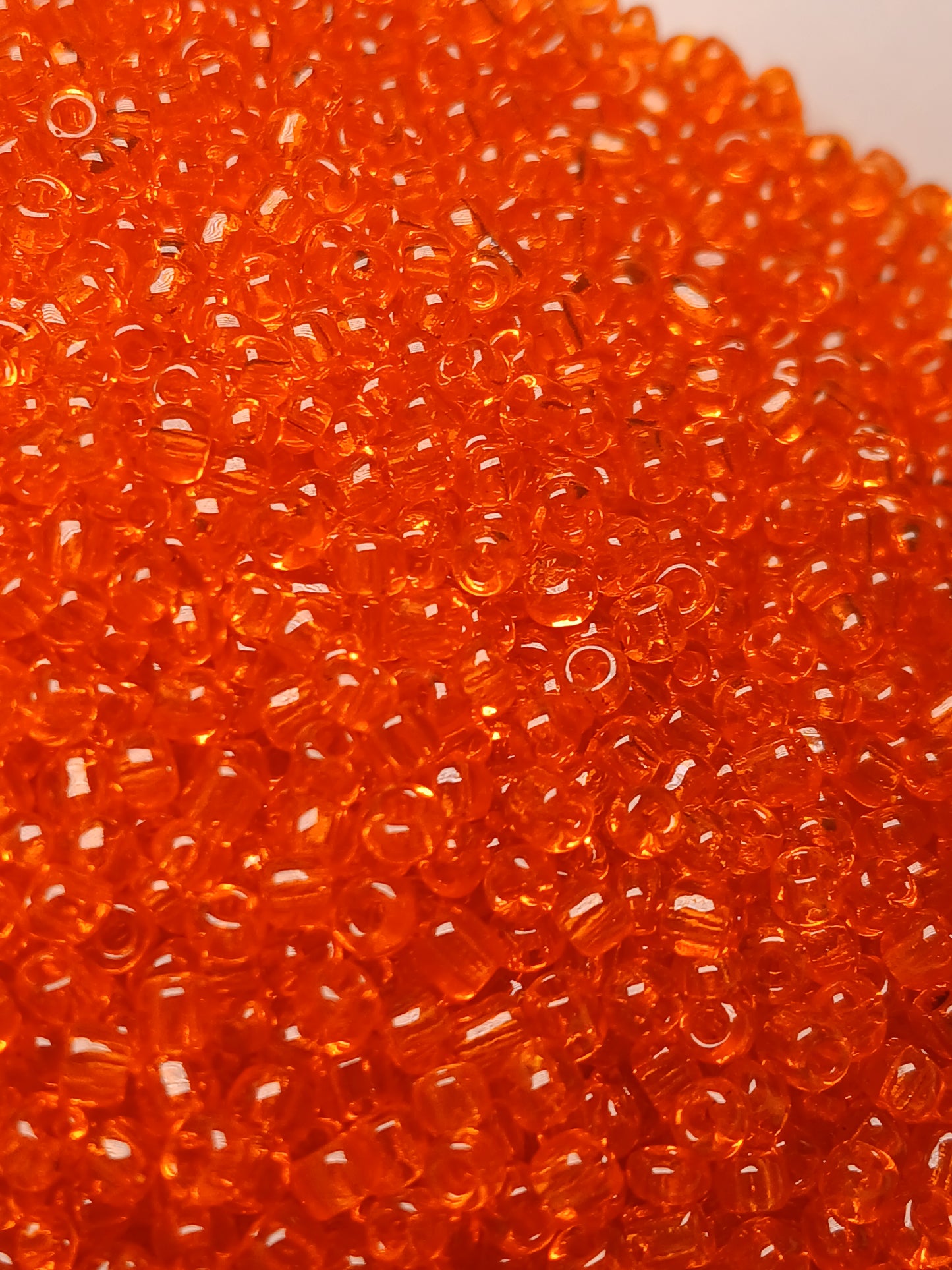 Transparent  orange seed beads