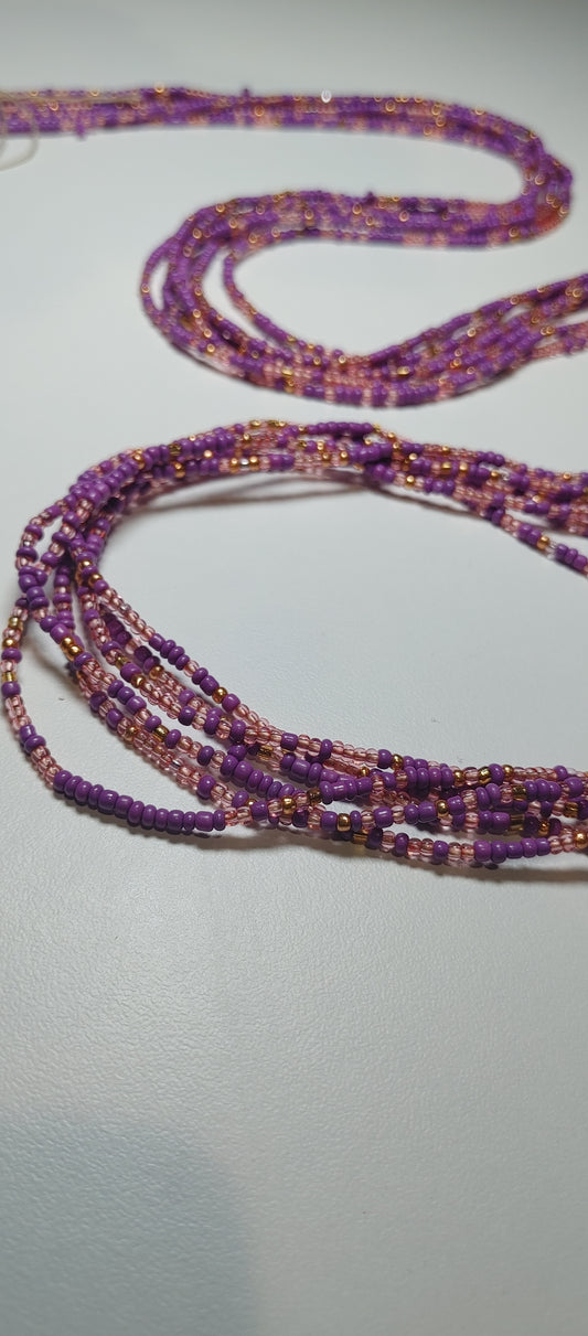 Purple and gold waistbeads.